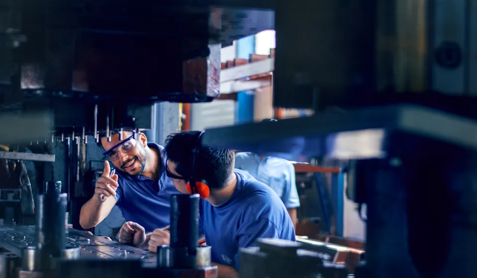 Photo of Men working on Electromechanical Units